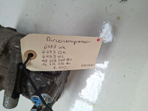 Originele aircocompressor van een Peugeot 207 CC (OEM 6453 WK / 6453 QK), bouwjaar 2009