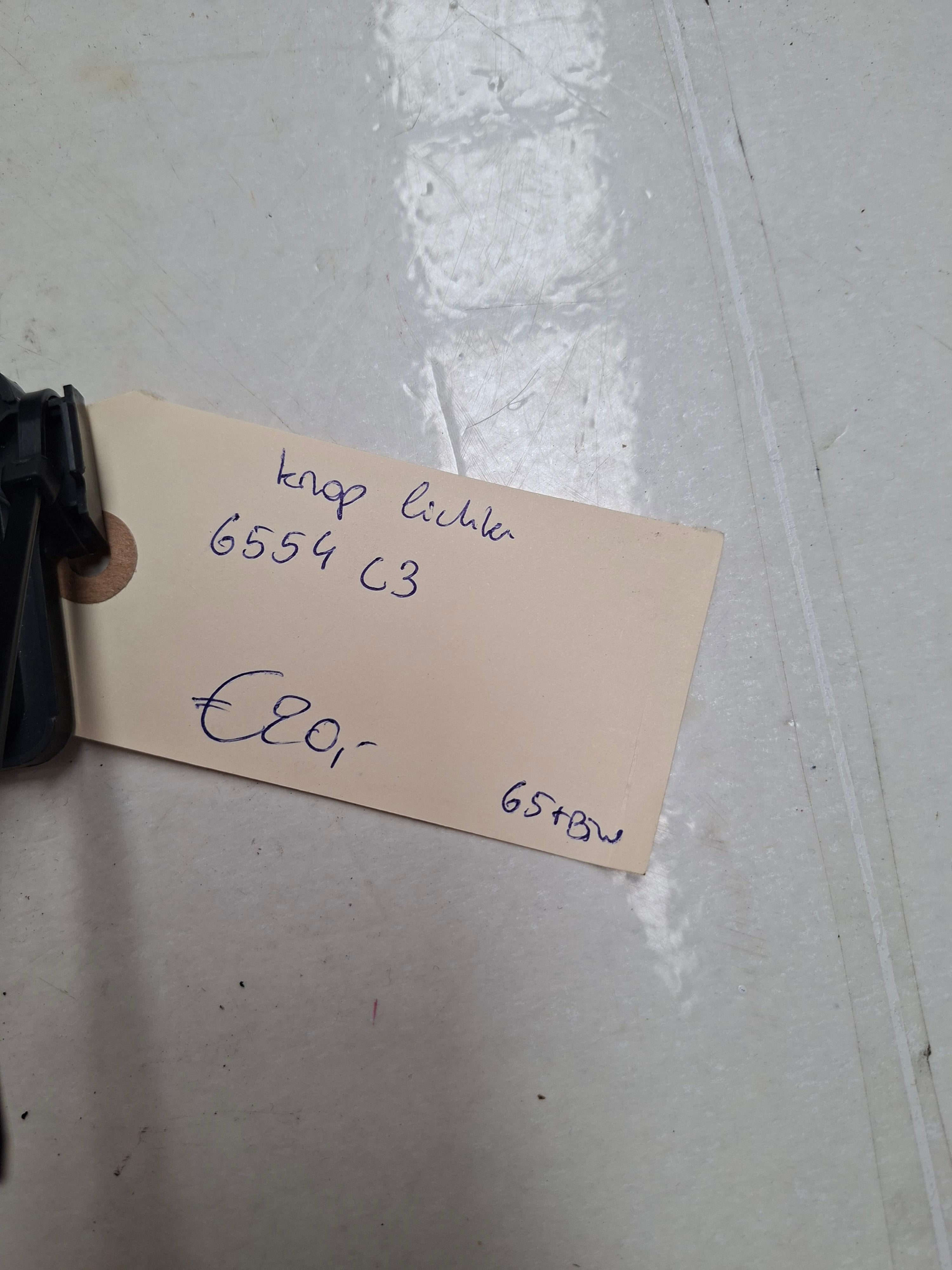 Originele lichtschakelaar dashboard van een Peugeot 3008 T84 (OEM 6554 C3), bouwjaar 2012