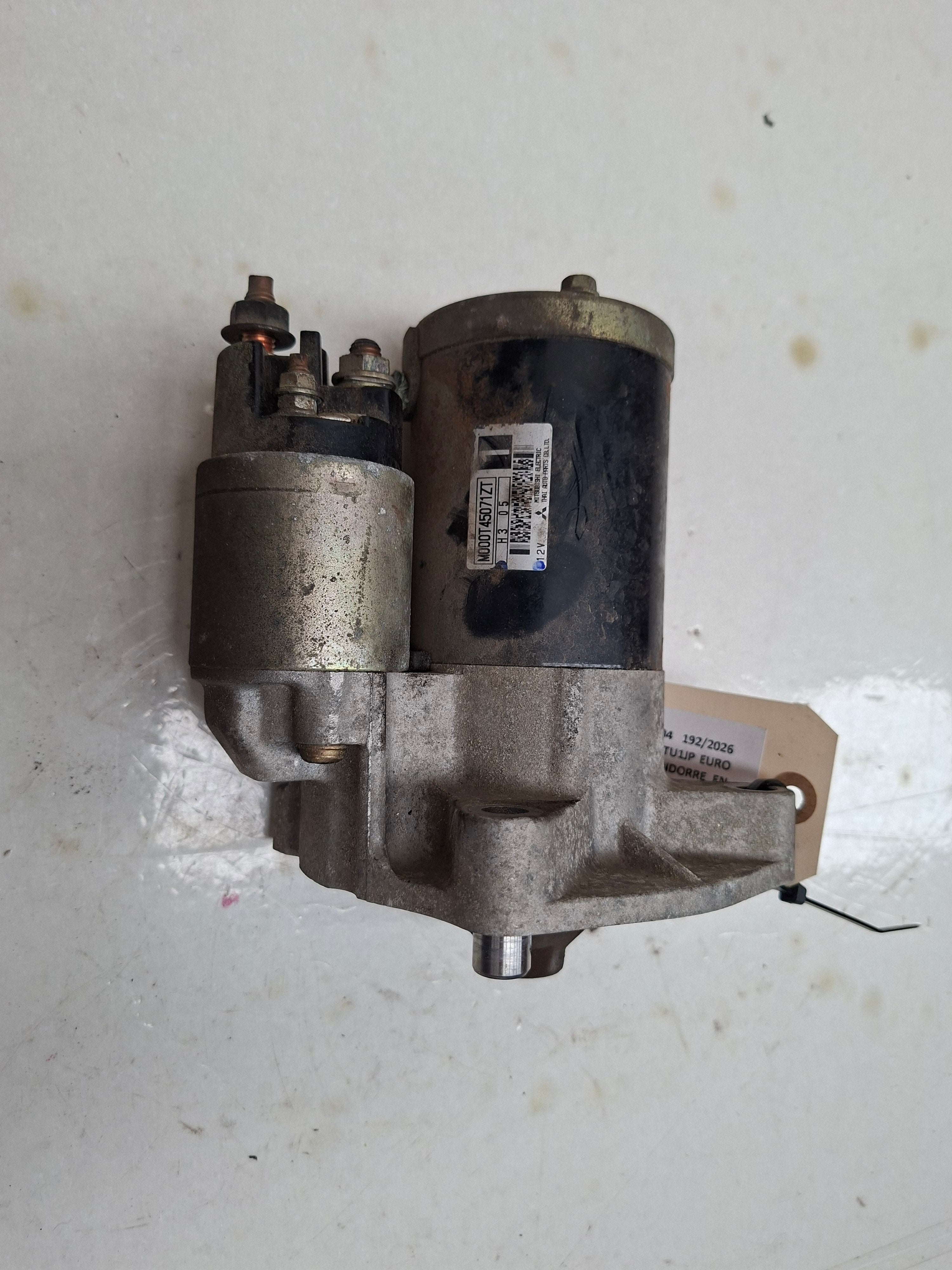 Originele starter van een Peugeot 206 (OEM 5802 M9 / 5802 CR), bouwjaar 2004

