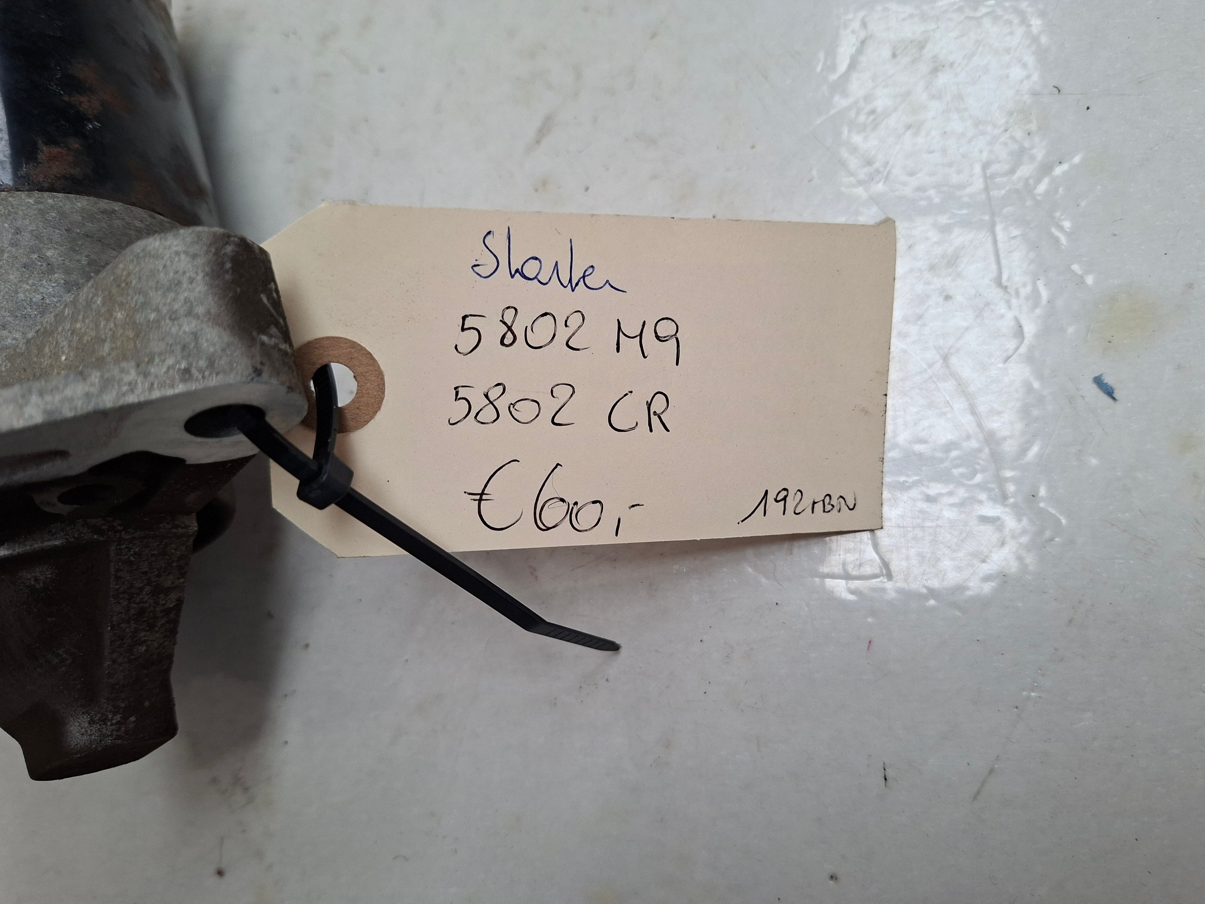 Originele starter van een Peugeot 206 (OEM 5802 M9 / 5802 CR), bouwjaar 2004

