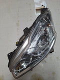 Originele koplamp links voor van een Peugeot 208 (OEM 98 022 218 80), bouwjaar 2013