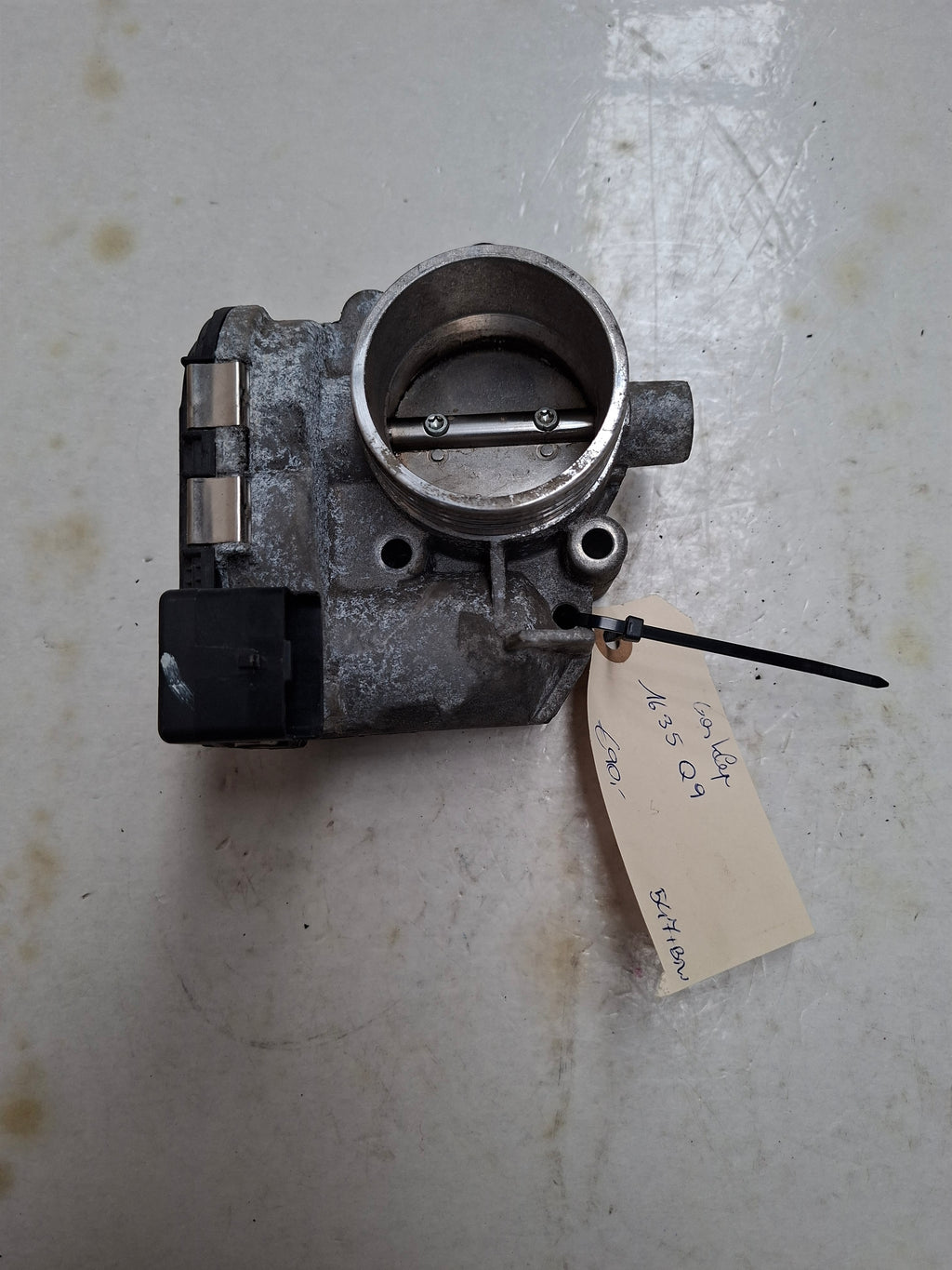 Originele gasklep van een Peugeot 206 (OEM 1635 Q9), bouwjaar 2004