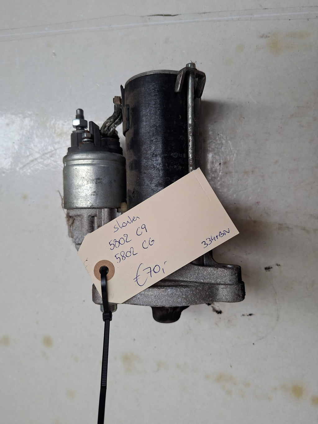 Originele starter van een Peugeot 206 (OEM 5802 C9 / 5802 CG), bouwjaar 2004