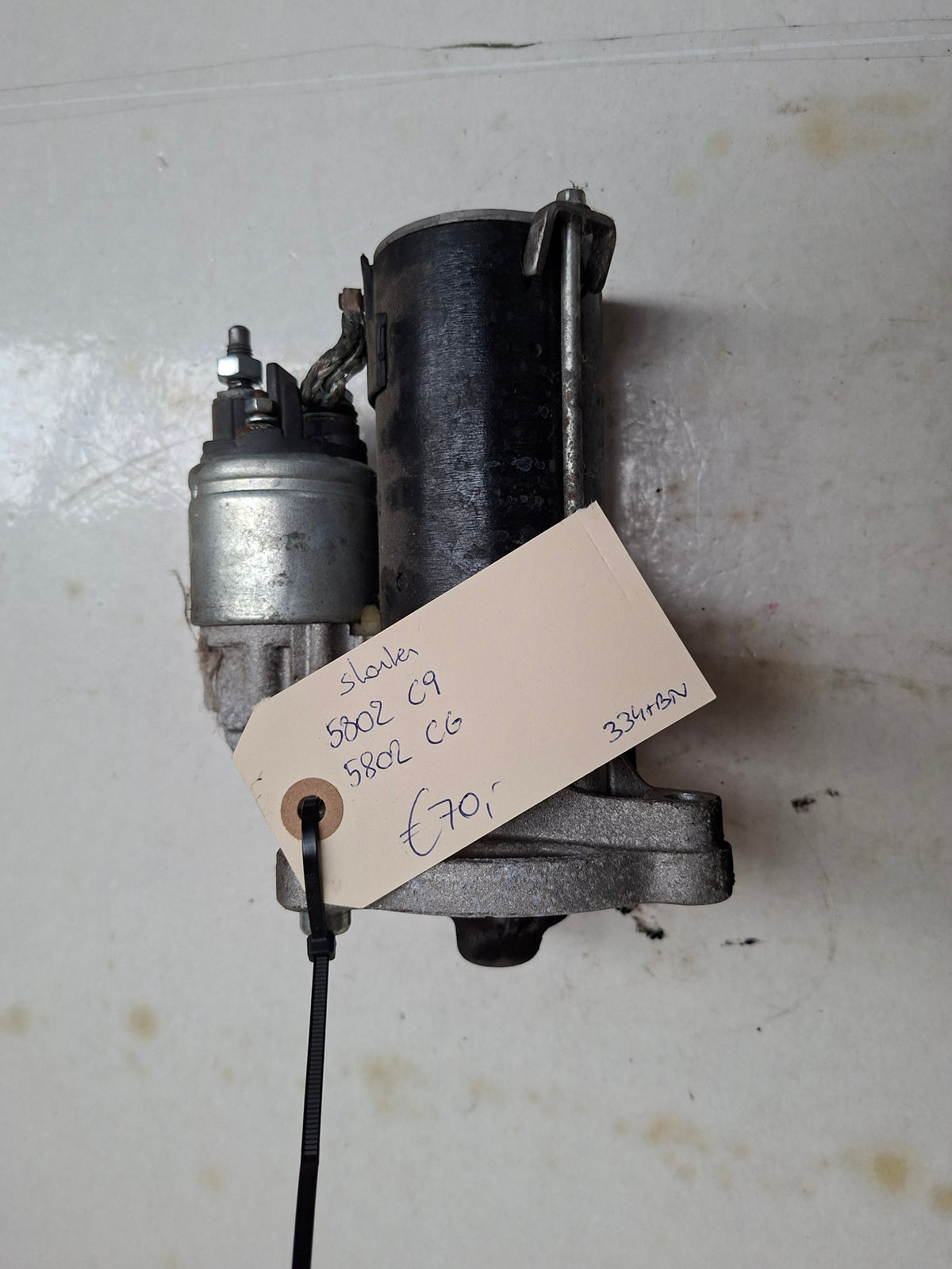 Originele starter van een Peugeot 206 (OEM 5802 C9 / 5802 CG), bouwjaar 2004