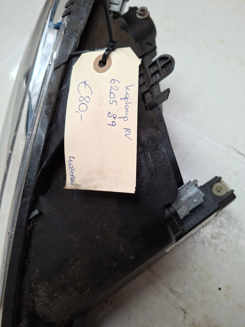 Originele koplamp rechts van een Peugeot 206 (OEM 6205 S9), bouwjaar 2004